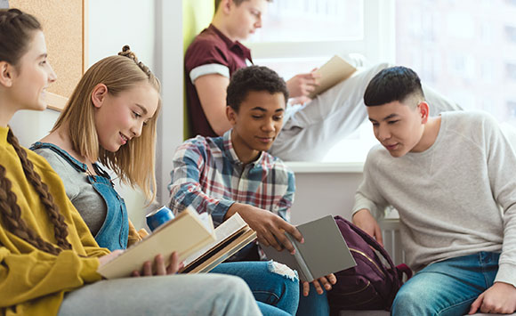 Teens reading books