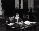 Miriam A. 'Ma' Ferguson sitting at a desk