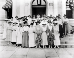 Women standing in front of the Travis County Courthouse on June 26, 1918