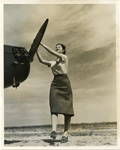 Woman with hands on a propellor