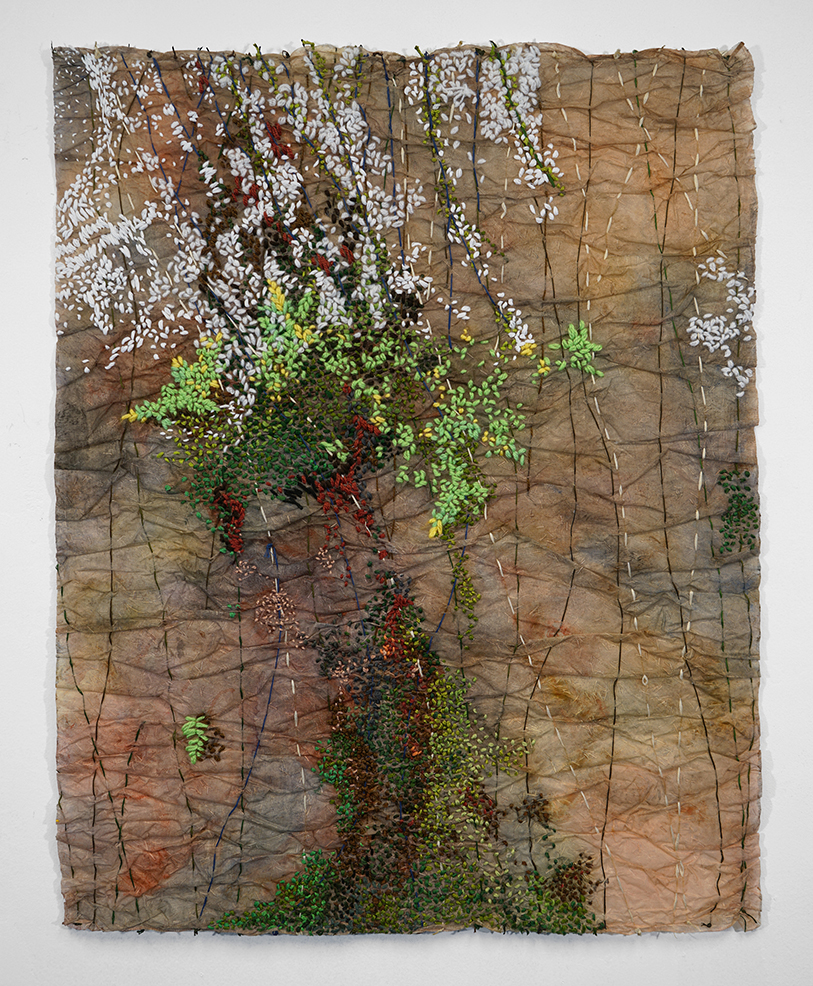 Handmade paper with sewn design