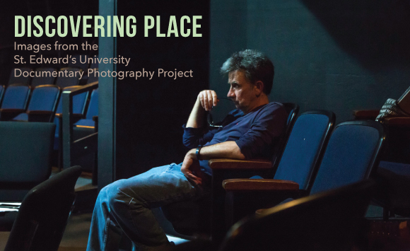 Man sitting in a chair with the text Discovering Place Images from the St. Edward’s University Documentary Photography Project