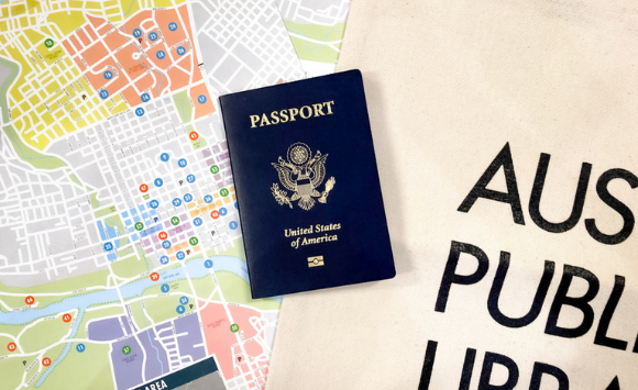 Image of a passport on a background of a map with the word Austin Public Library