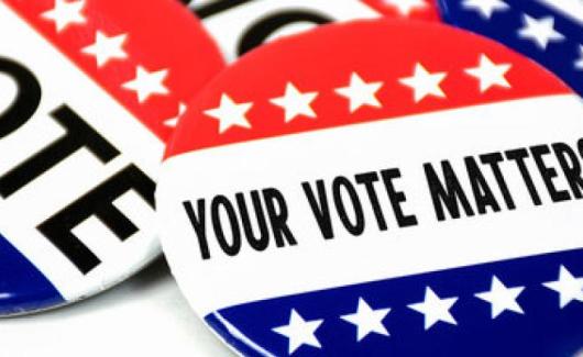 buttons with red, white and blue colors. Text that says "vote" and "your vote matters"