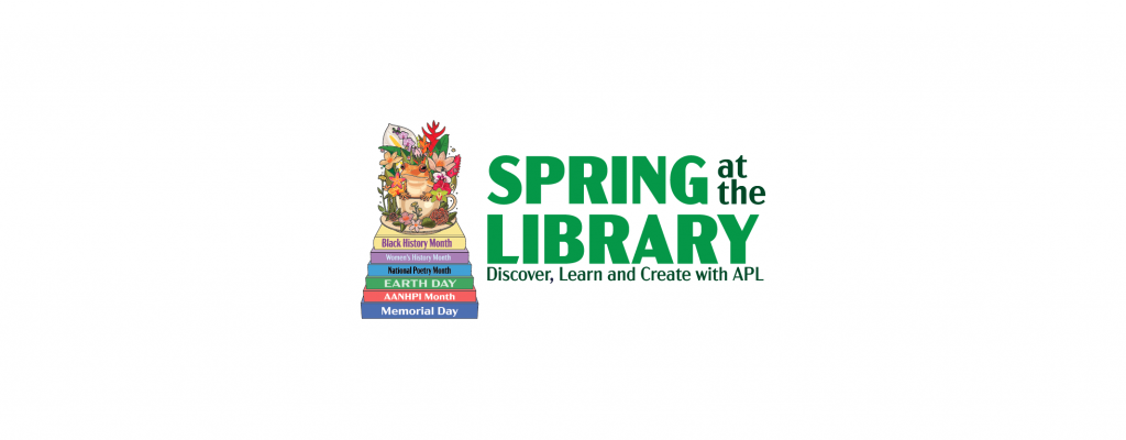 A stack of books with a coffee on top. The cup holds an orange frog and spring floral mix. 