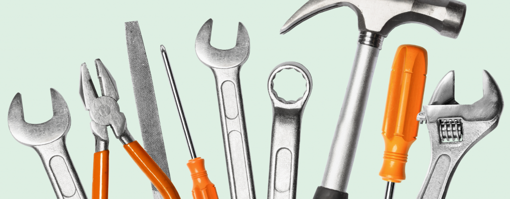 Tool library logo with an assortment of wrenches, screwdrivers, and hammers