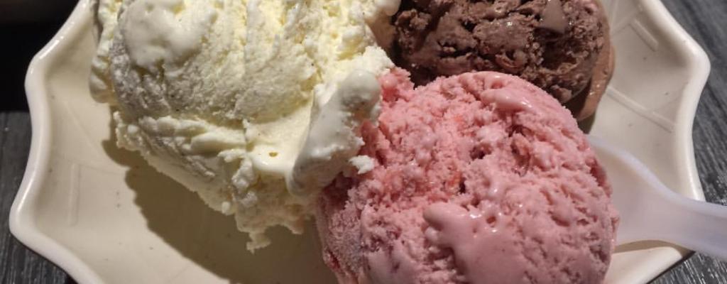 cup of three flavors of ice cream