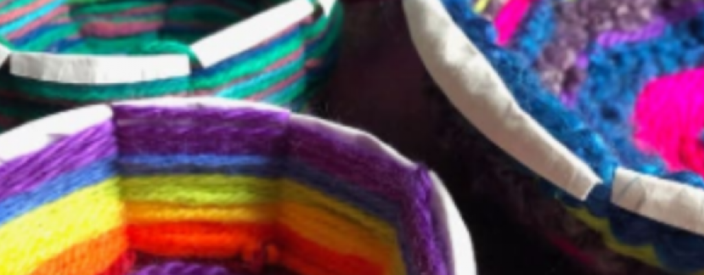 Woven yarn bowls of different colors and patterns