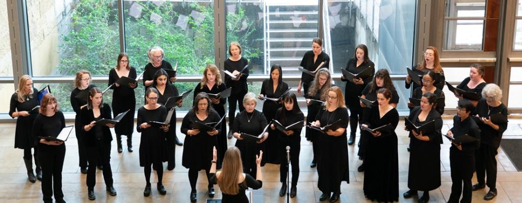 chorus stands ready to perform